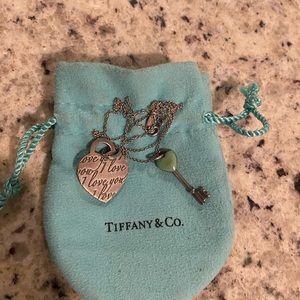 Tiffany & Co. necklace, 2 charms, good condition it comes with box.